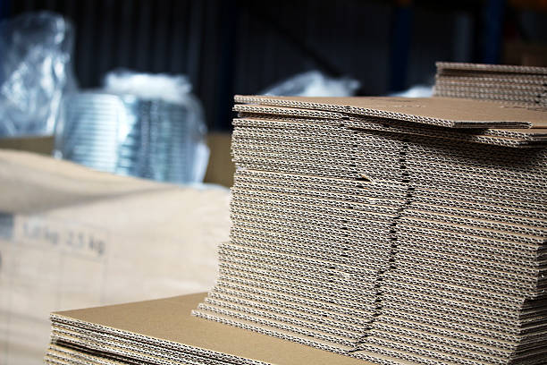 Unfolded cardboards for boxes in the warehouse